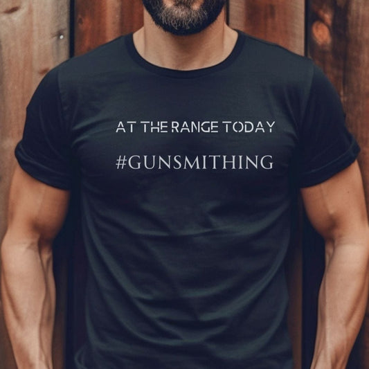 black t-shirt saying at the range today with hashtag gunsmithing, in white imprint
