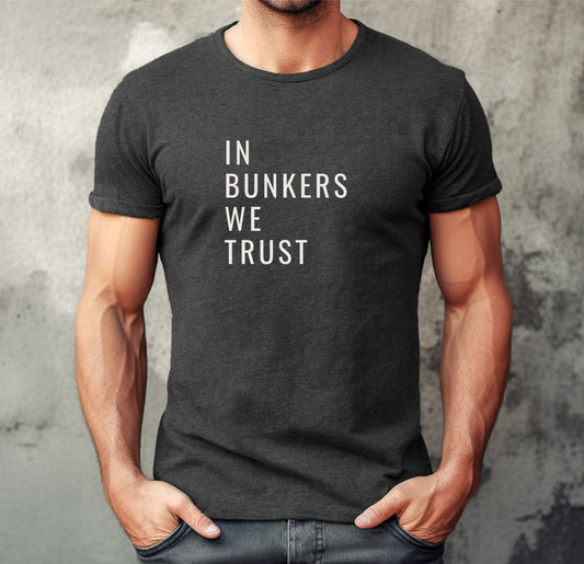 men wearing dark gray t-shirt saying in bunkers we trust, with imprint